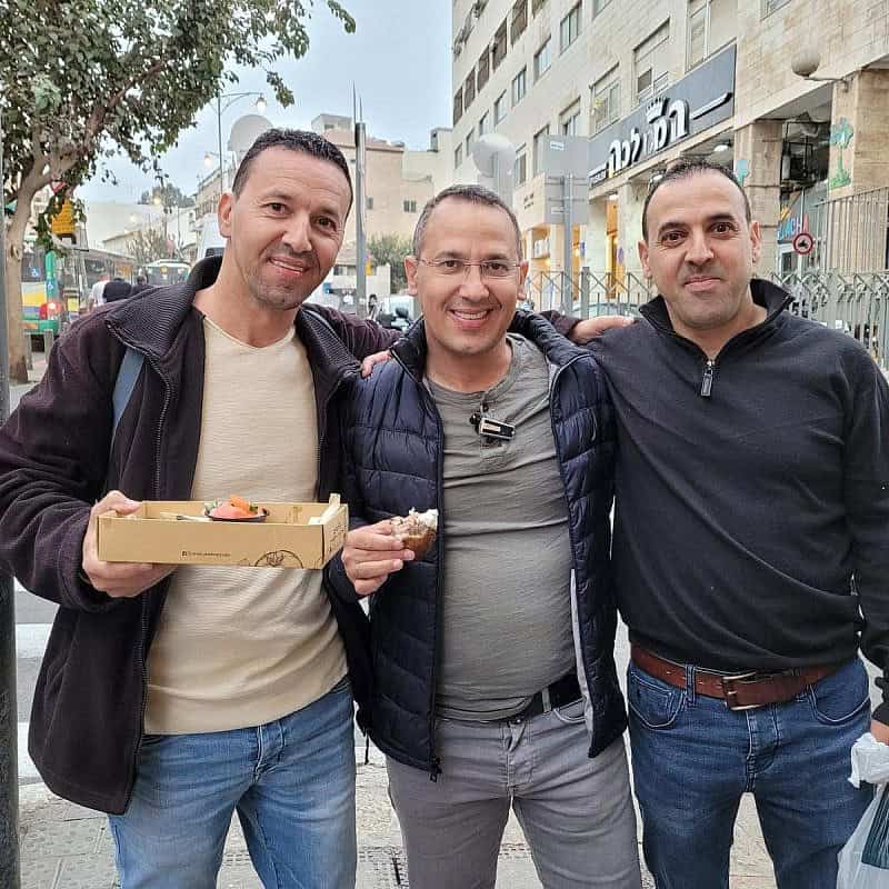 From left, brothers Yossi, Sharon and Eli Sharabi. Credit: Courtesy of the Hostage and Missing Families Forum.