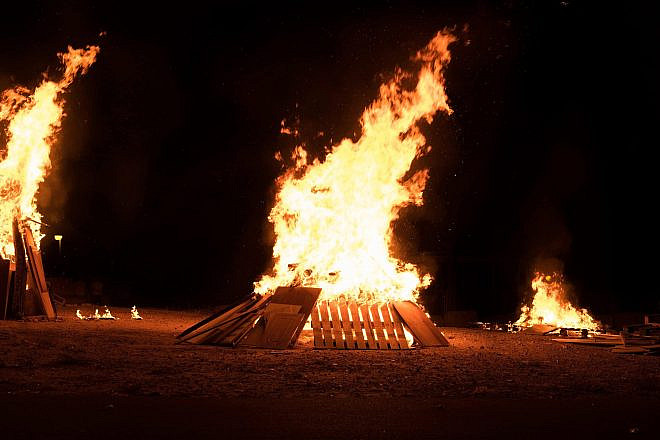 A bonfire celebrating the holiday of Lag B'Omer, which commemorates Rabbi Shimon Bar Yochai. Credit: Lerner Vadim/Shutterstock