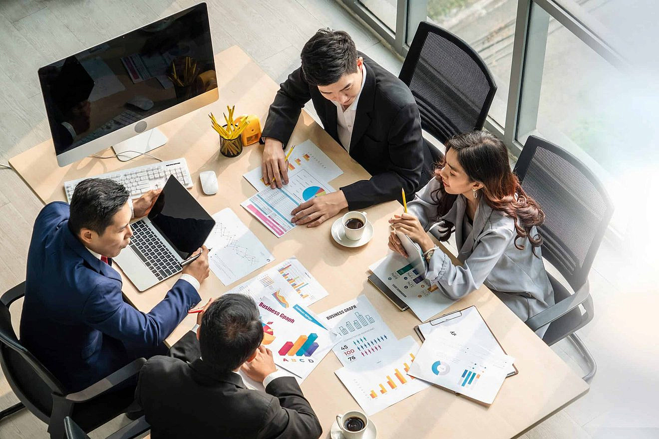 An illustrative image of office workers. Credit: Summit Art Creations/Shutterstock