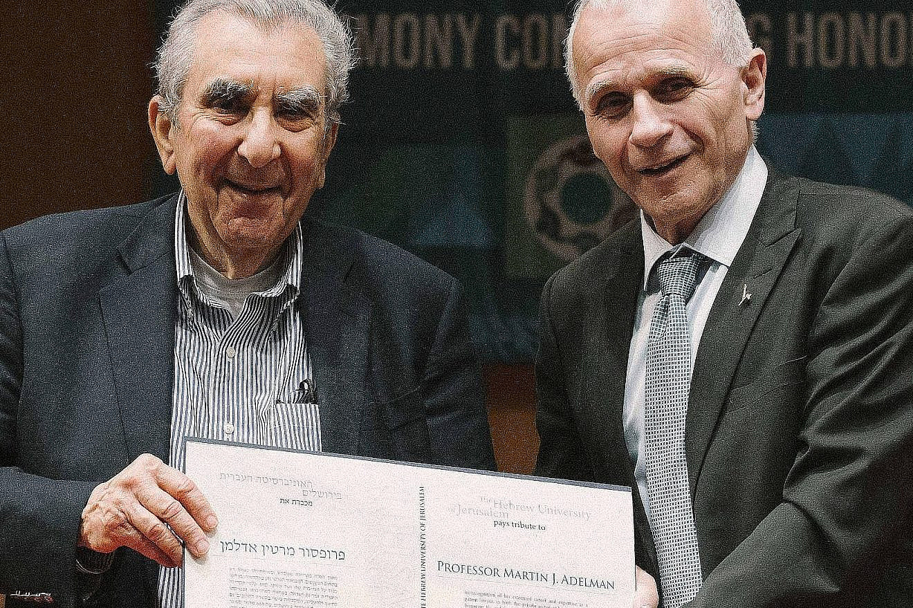 The Hebrew University of Jerusalem president, professor Asher Cohen (right) presented an honorary fellowship to renowned intellectual property and technology professor Martin J. Adelman (left) during the 87th Board of Governors meeting in Jerusalem. Photo by Maxim Dinshtein.