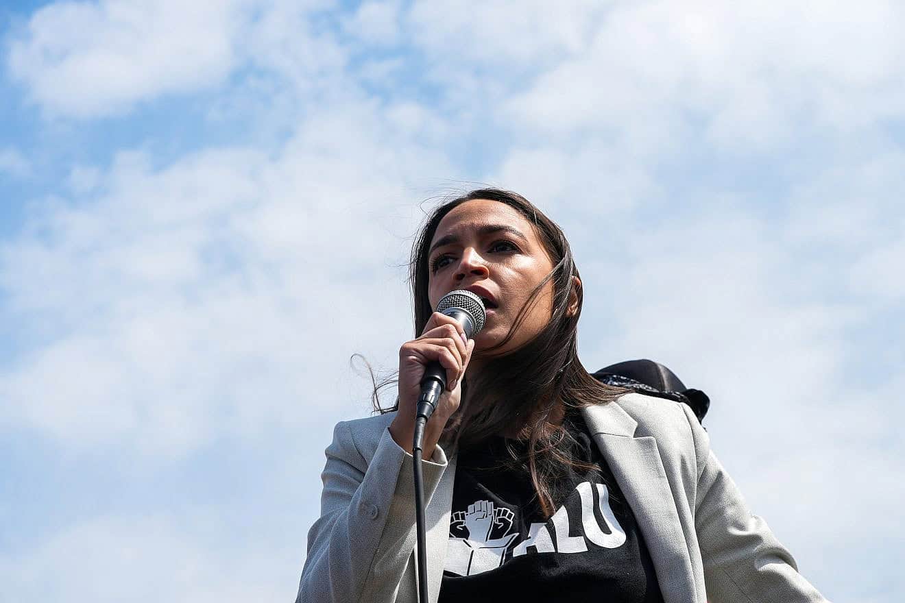 Rep. Alexandria Ocasio-Cortez (D-N.Y.) at a rally on Staten Island with workers from the JFK8 Amazon fulfillment center who formed the first Amazon Union, April 2022. Credit: John Nacion/Shutterstock.