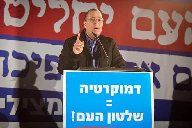 Eli Zipori speaks during a protest in support of Israeli Prime Minister Benjamin Netanyahu and against the judicial overreach in Tel Aviv, Dec. 30, 2019. Photo by Flash90.