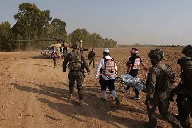 Evacuating the wounded in the Iron Swords War, 2023. Photo by Oren Cohen.