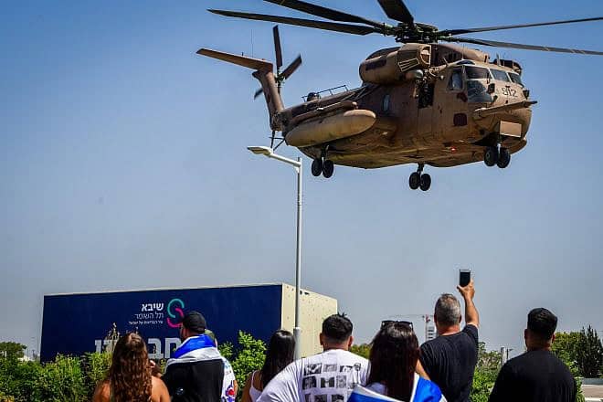 An Israeli military helicopter, with fighters who participated in the hostage-rescue operation, arrives at the Sheba Medical Center in Ramat Gan, June 8, 2024. Photo by Avshalom Sassoni/Flash90.