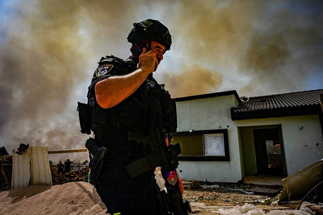 Police at the site where a rocket fired by Hezbollah in Lebanon hit and caused damage in the northern Israeli town of Katzrin, June 13, 2024. Photo by Michael Giladi/Flash90.