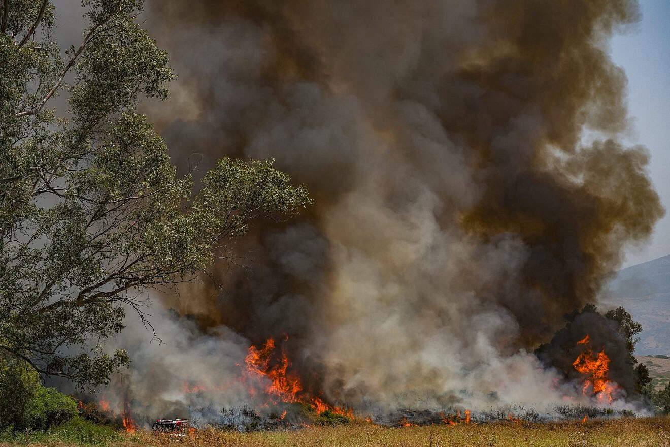 A massive fire sparked by Hezbollah missiles launched from Lebanon, near Kibbutz Kfar Szold, northern Israel, June 14, 2024. Photo by Ayal Margolin/Flash90.