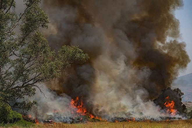 A massive fire sparked by Hezbollah missiles launched from Lebanon, near Kibbutz Kfar Szold, northern Israel, June 14, 2024. Photo by Ayal Margolin/Flash90.