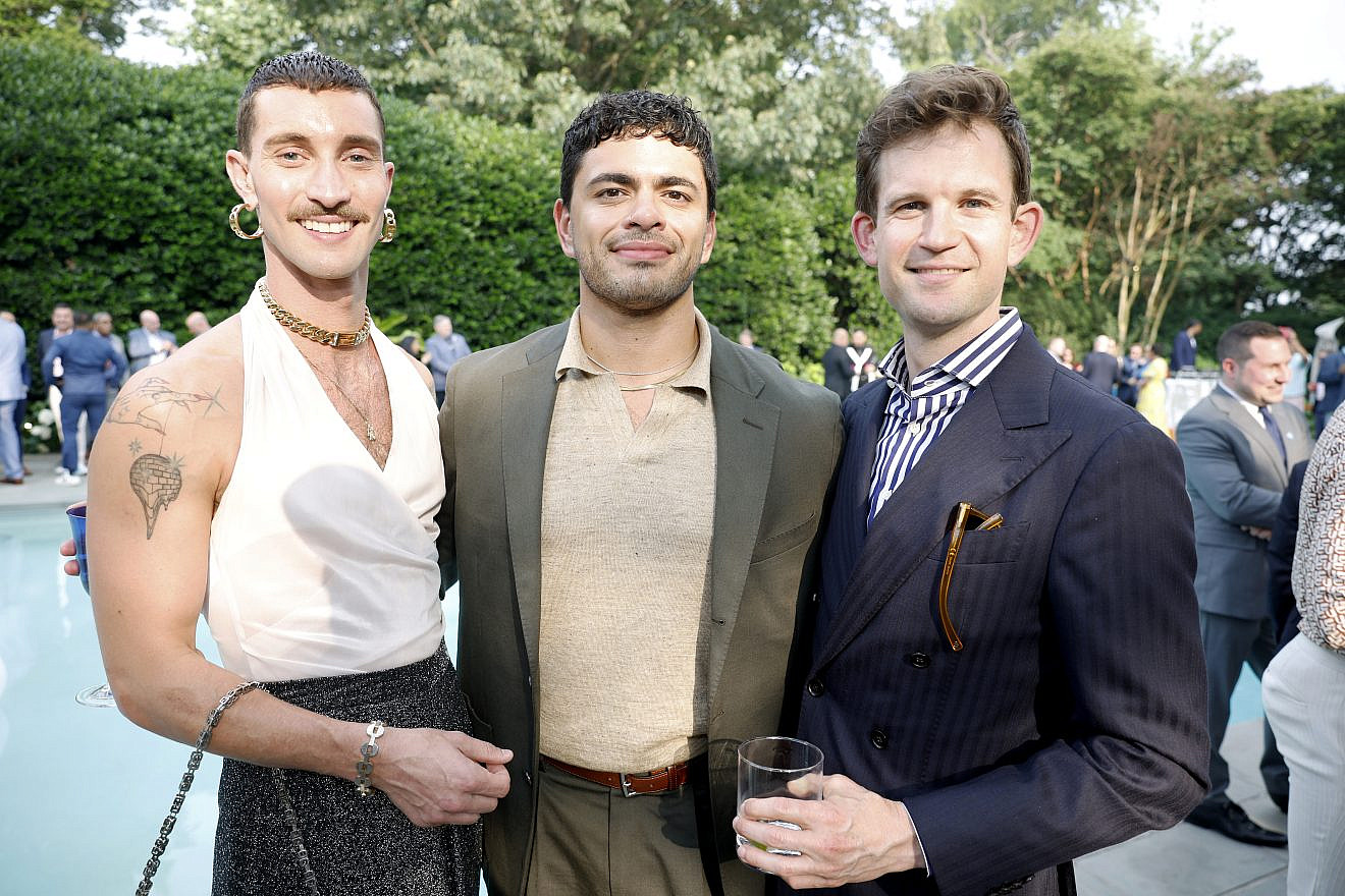 Tyler Cherry (left) poses with Michael Vazquez (middle) and Jamie Citron at a Pride celebration hosted by U.S. Vice President Kamala Harris and her husband, Doug Emhoff, with GLAAD on June 28, 2023 in Washington, DC. Photo by Tasos Katopodis/Getty Images for GLAAD.