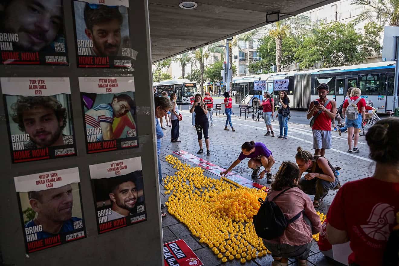 Demonstrators outside the Tel Aviv Municipality building protest, calling for the Tel Aviv Municipality to strike until the release of Israelis held hostage in the Gaza Strip and calling for early elections, on June 23, 2024. Photo by Avshalom Sassoni/Flash90.