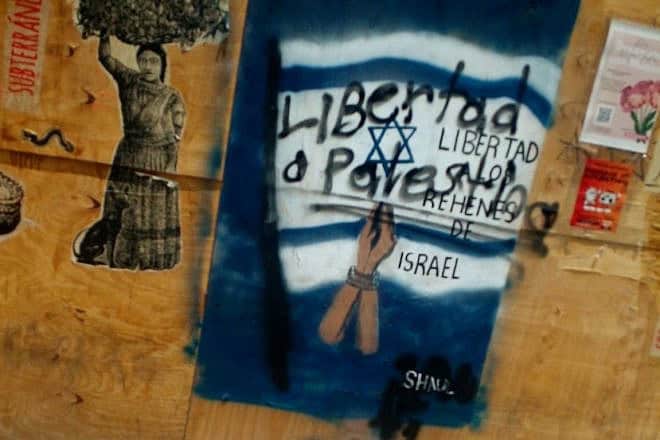 "Free Israel's hostages," the street art read in Oaxaca, Mexico, before it was defaced. Credit: Courtesy.