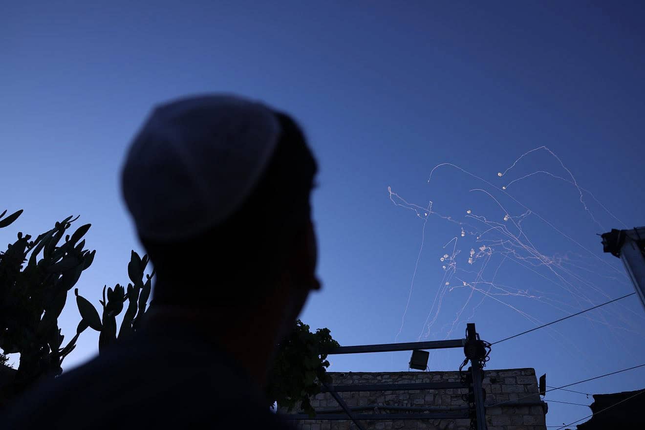 An anti-missile system fires interception missiles as rockets fired from Southern Lebanon, as it seen from the northern Israeli town of Safed on June 27, 2024. Photo by David Cohen/Flash90.
