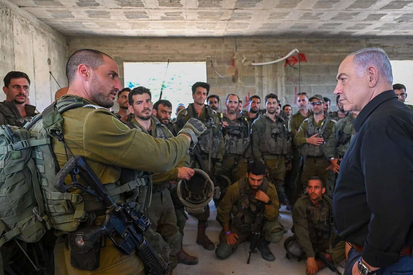 Prime Minister Benjamin Netanyahu meets with Israel Defense Forces soldiers in the north, where he vowed to achieve total victory over the Jewish state's enemies, June 25, 2024. Photo by Kobi Gideon/GPO.