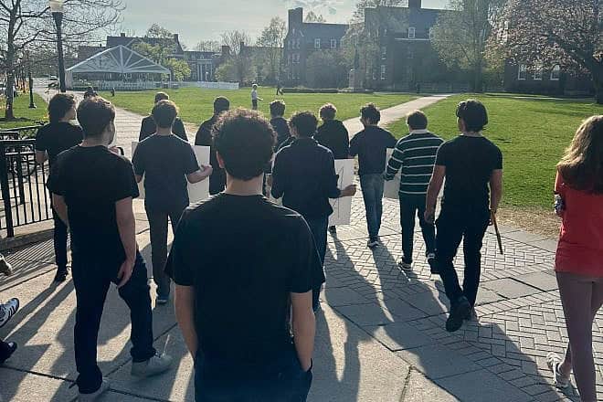 AEPi Brothers at the University of Rochester in Rochester, N.Y., organized a campus-wide walk to raise awareness of the Holocaust. Credit: Courtesy.