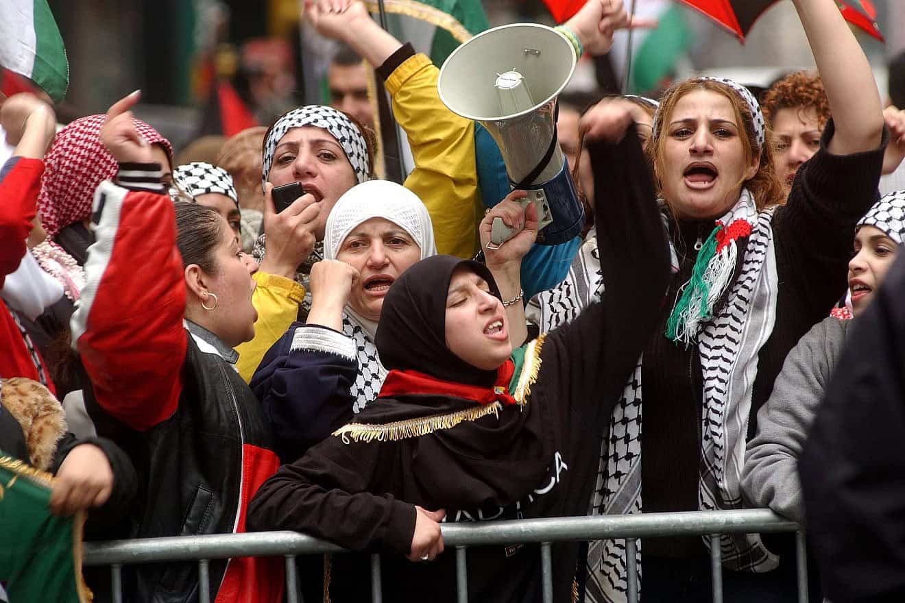 Pro-Palestinian demonstrators chant anti-Israel slogans in Times Square, New York City, on April 12, 2002. Photo by Spencer Platt/Getty Images.