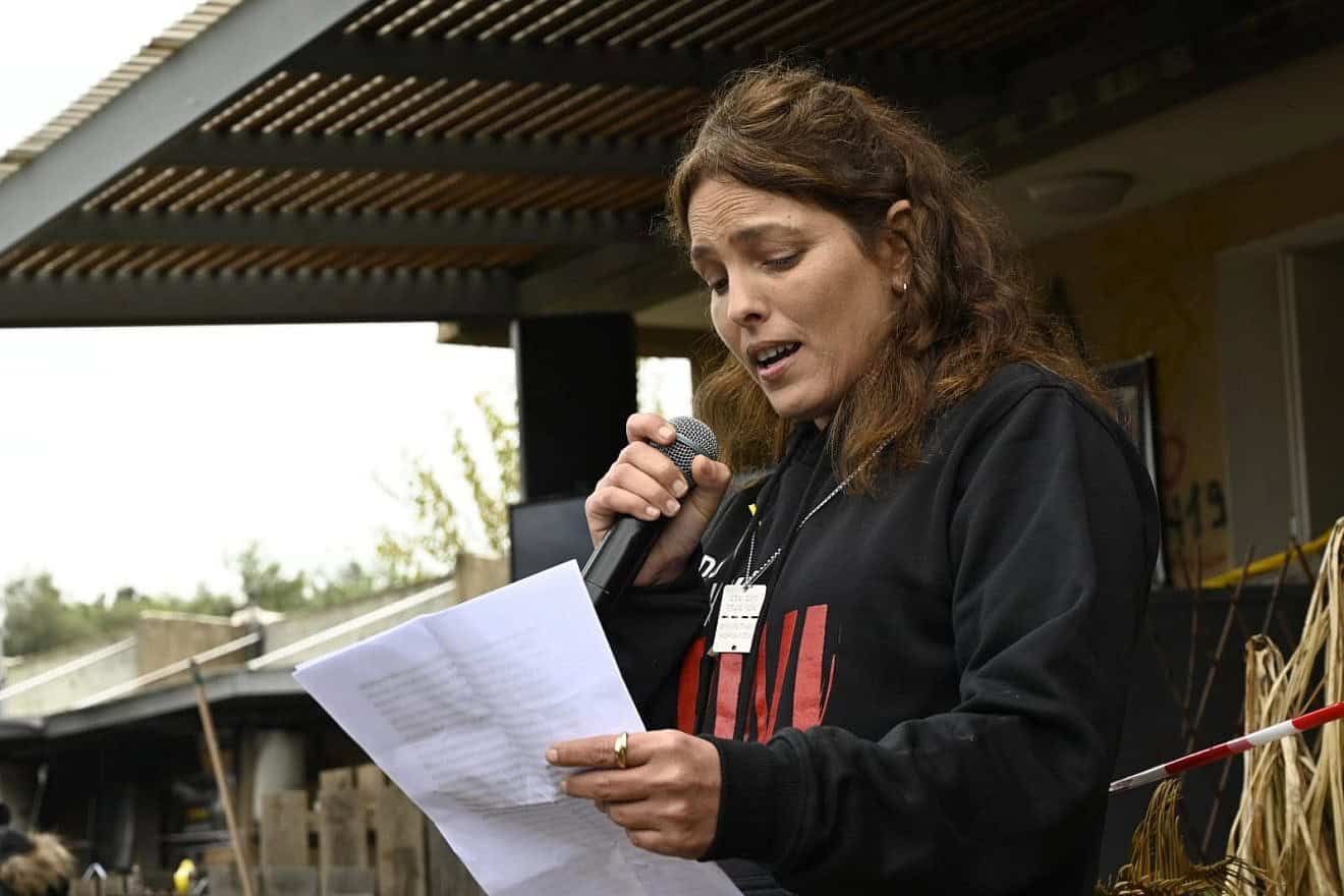 Released hostage Amit Soussana in front of her destroyed home in Kibbutz Kfar Aza, southern Israel, Jan. 29, 2024. Photo by Paulina Patimer.