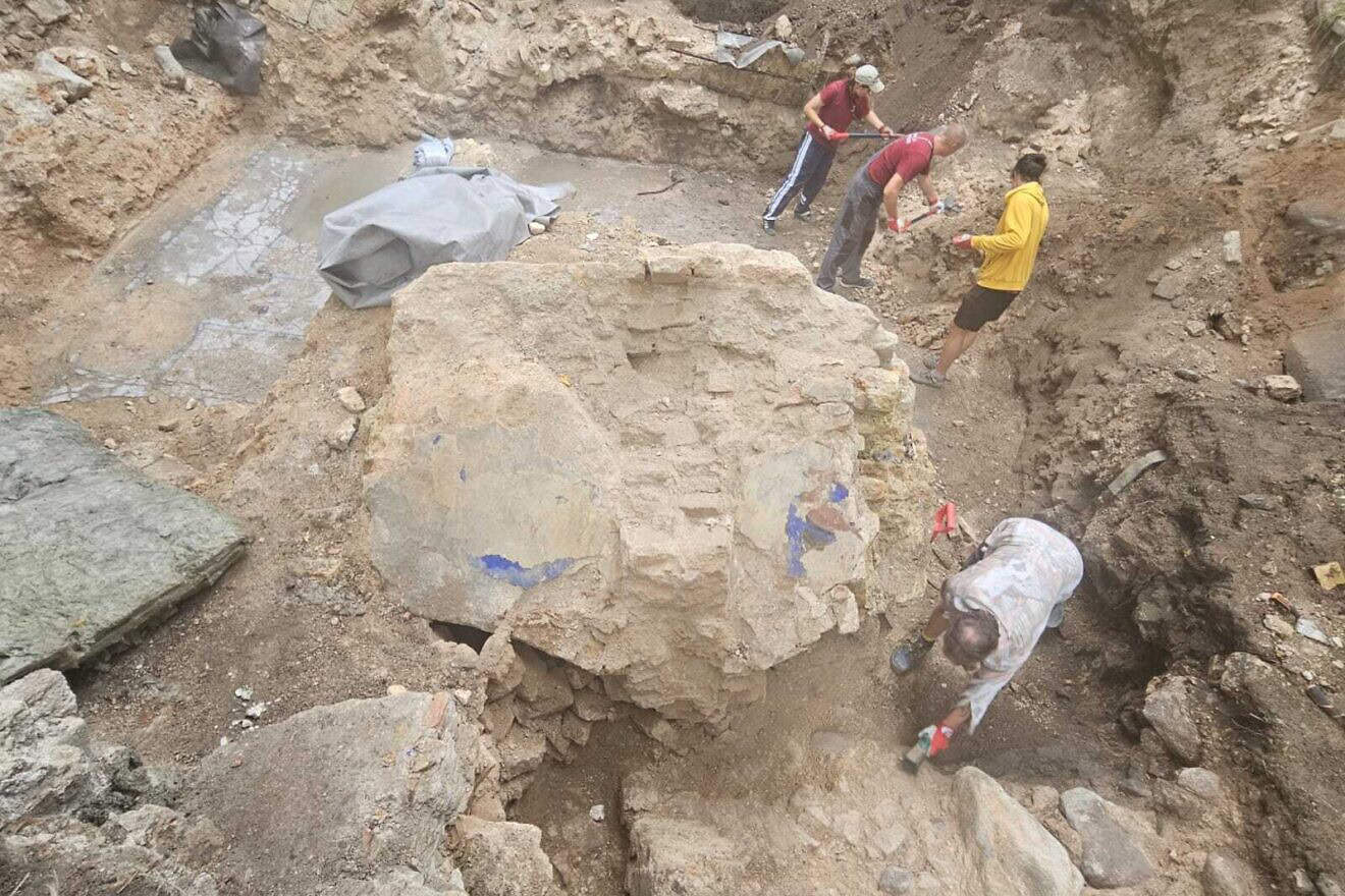 Colored fragments of wall uncovered during excavation of the Great Synagogue of Vilna in Lithuania testify to the building's once-beautiful decorations, according to the Israel Antiquities Authority. Credit: Israel Antiquities Authority.