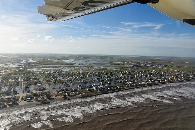 A Coast Guard aircrew conducts flyovers in Texas to assess the damage left behind by Hurricane Beryl in Matagorda, Texas City, Galveston and Houston, July 8, 2024. Credit: Petty Officer 2nd Class Jessica Fontenette/U.S. Coast Guard Photo.