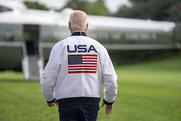 U.S. President Joe Biden wears a Team USA jacket before boarding Marine One en route to Camp David on July 26, 2024. Credit: Adam Schultz/White House.
