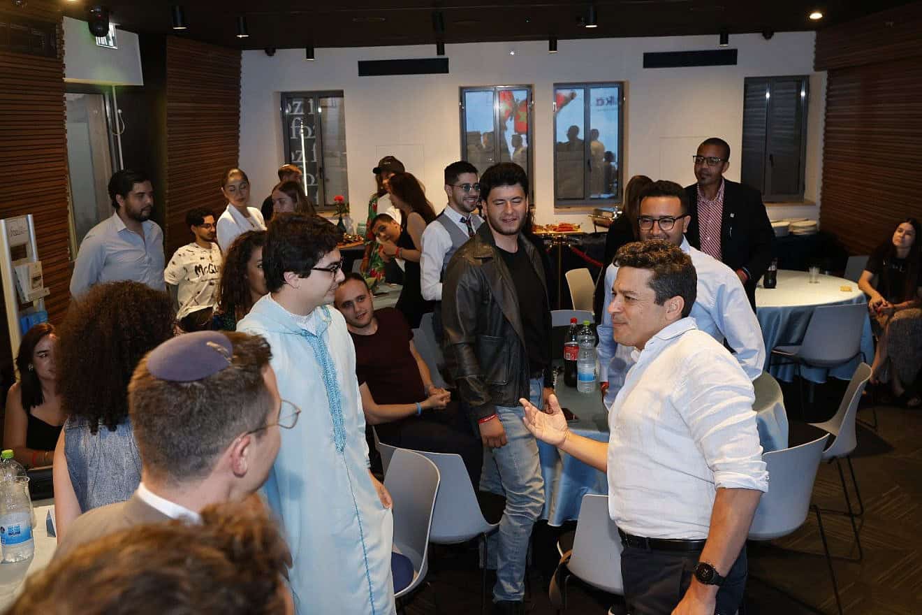 Diaspora Affairs Minister Amichai Chikli (right) speaks with the guests from Morocco at the Friends of Zion Museum in Jerusalem, July 9, 2024. Photo by Yossi Zamir.
