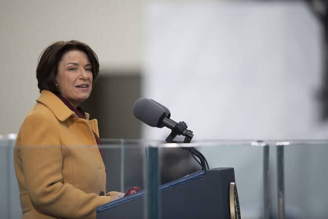 Sen. Amy Klobuchar (D-Minn.) speaks during the inauguration ceremony of U.S. President Joe Biden in Washington on Jan. 20, 2021. Credit: U.S. Department of Defense Photo by Navy Petty Officer 1st Class Carlos M. Vazquez II via Wikimedia Commons.