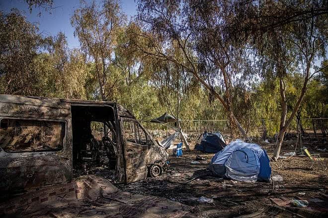 A burned ambulance at the scene of ​​the Nova music festival, where Gazan terrorists killed, raped and kidnapped hundreds of Israelis, Oct. 12, 2023. Photo by Chaim Goldberg/Flash90.