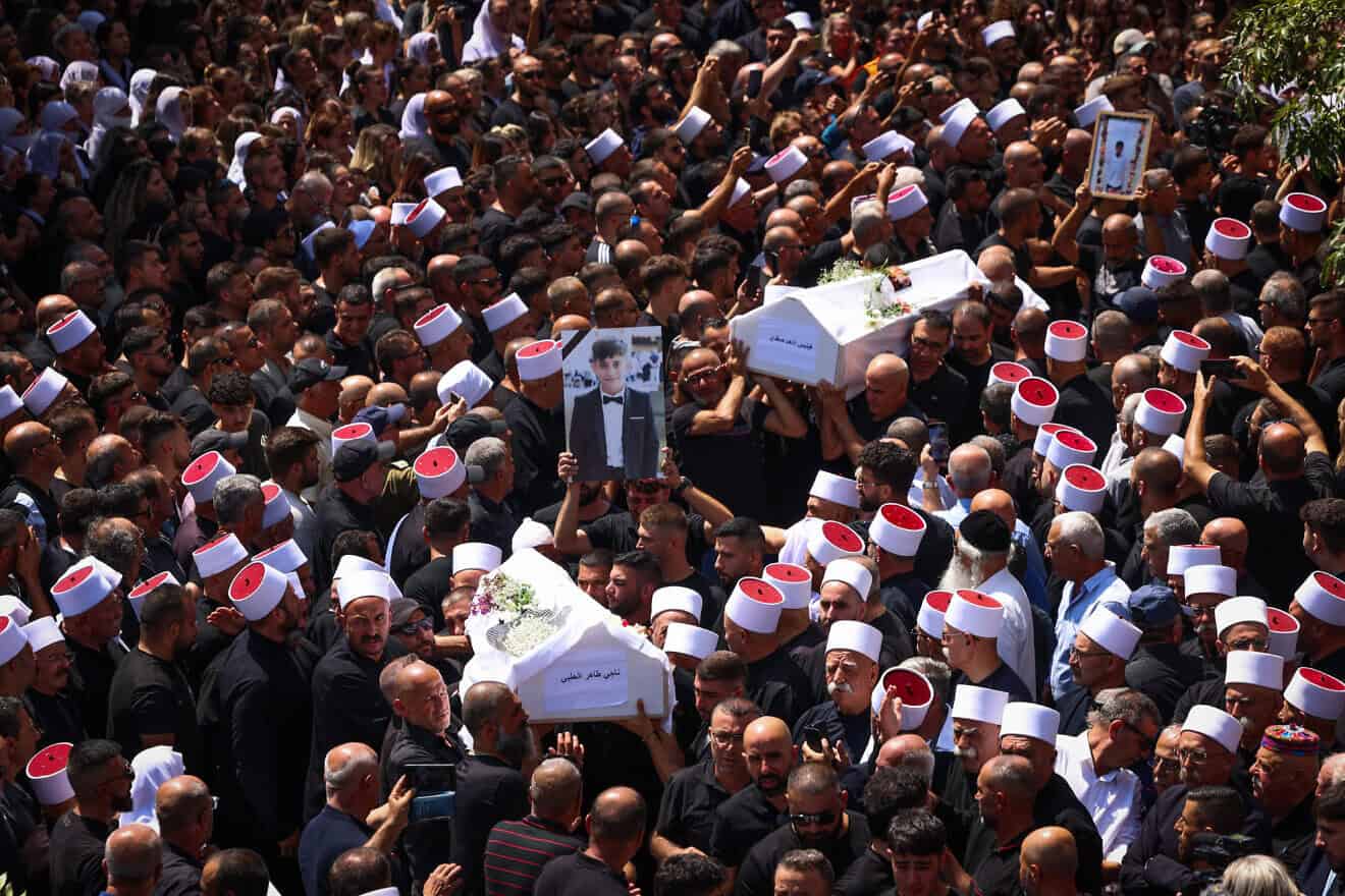 Mourners attend the funeral in Majdal Shams of Druze children killed by a Hezbollah rocket fired from Lebanon, July 28, 2024. Photo by Ayal Margolin/Flash90.