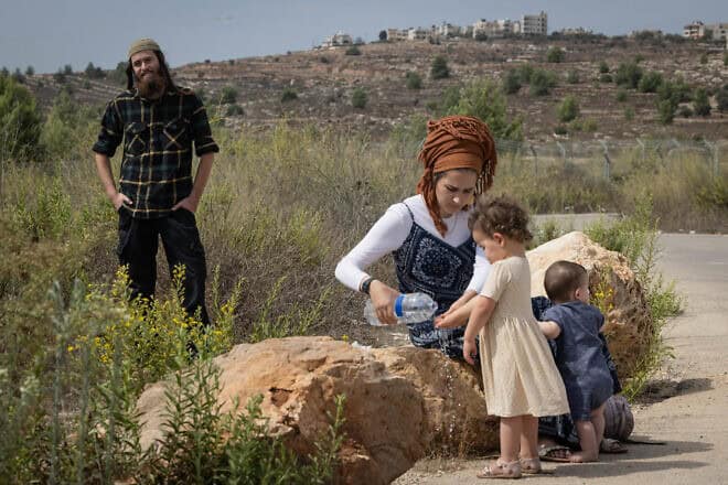 Elisha Yered (left), who was briefly detained on charges of involvement in the death of a Palestinian in Samaria, and his family outside the Ofer military court, Oct. 5, 2023. Photo by Chaim Goldberg/Flash90.