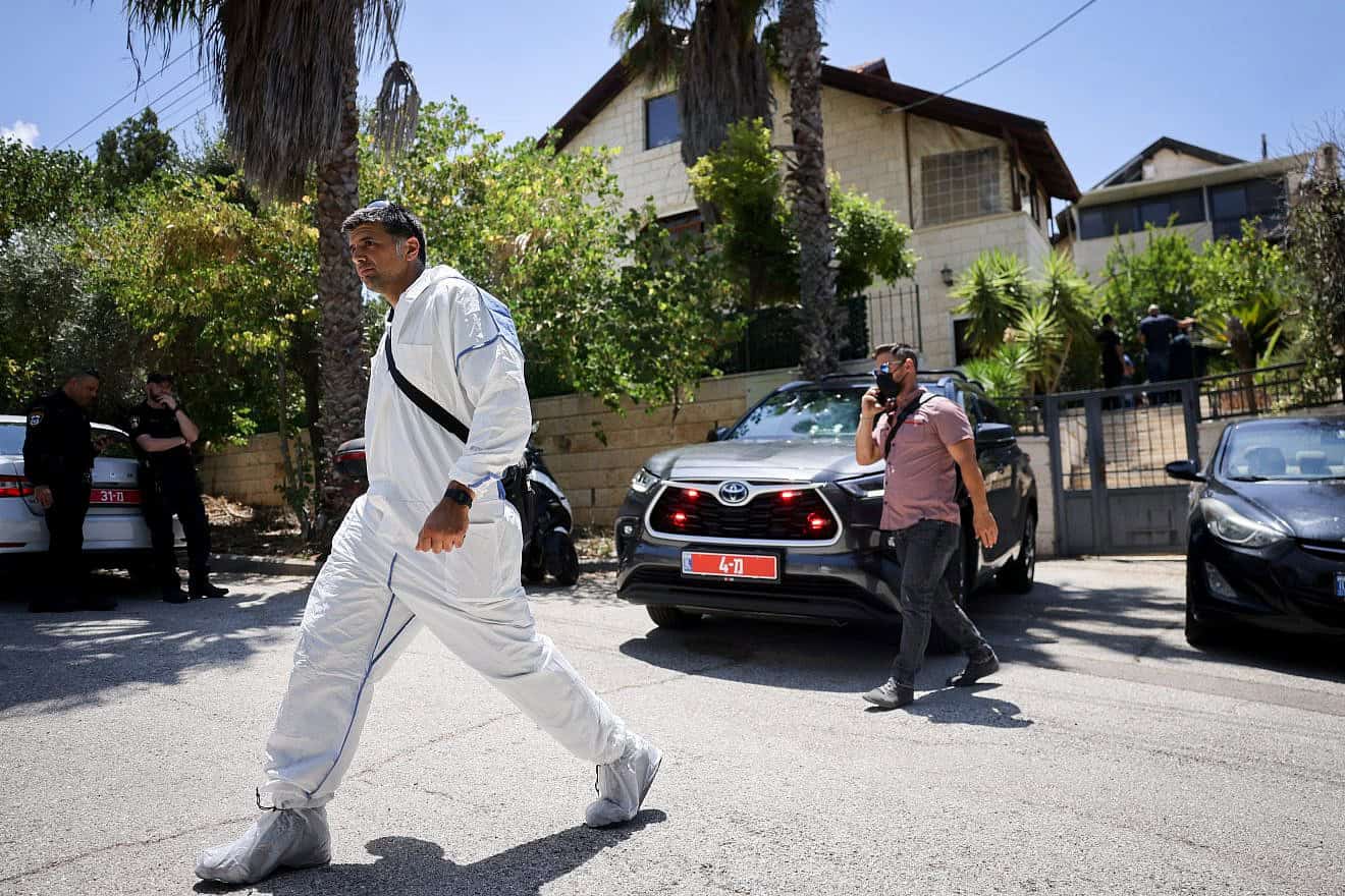 Security personnel at the scene where an Israel Prison Service officer was found murdered, in Givon Hahadasha, Samaria, July 8, 2024. Photo by Chaim Goldberg/Flash90.