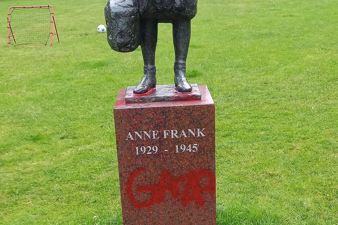 An antisemitic vandal defaced a statue of Anne Frank in Amsterdam with graffiti reading "Gaza," July 9, 2024. Credit: Courtesy of the Center for Information and Documentation Israel.
