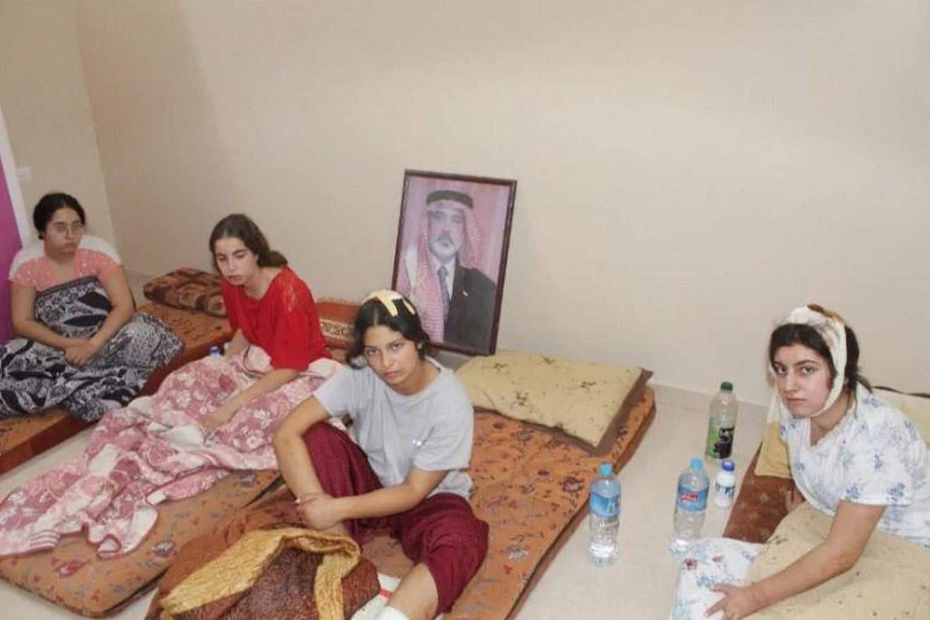A photo still shot of a video showing Liri Albag, Karina Ariev, Agam Berger and Daniela Gilboa shortly after their kidnapping from the Nahal Oz Israeli military base on Oct. 7, 2023. Credit: Courtesy of the Hostages Families Forum.