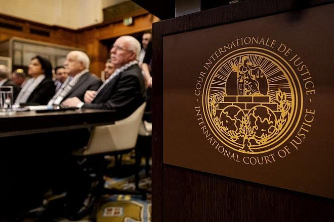 Palestinian Authority diplomat Riyad al-Maliki and members of his delegation at the International Court of Justice in The Hague, Feb. 19, 2024. Photo by Robin van Lonkhuijsen/ANP/AFP via Getty Images.