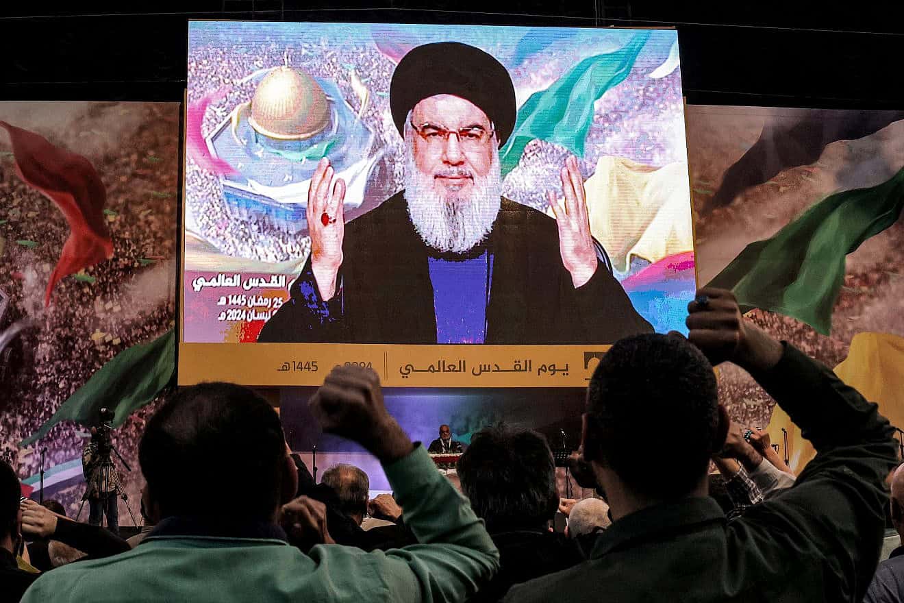 Hezbollah Secretary-General Hassan Nasrallah delivers a televised speech during a gathering to mark annual Quds (Jerusalem) Day commemorations in south Beirut on April 5, 2024. Photo by Anwar Amro/AFP via Getty Images.