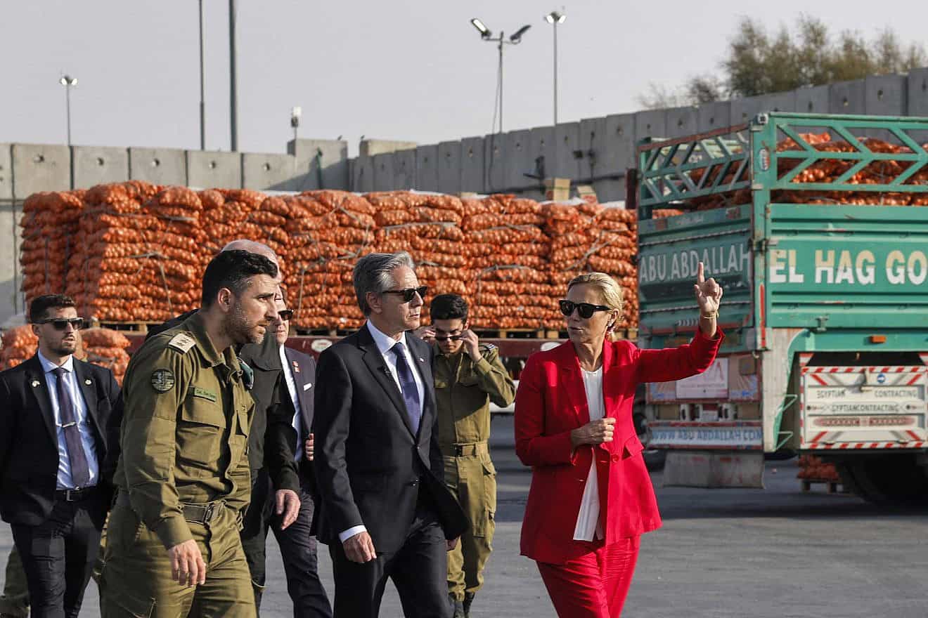 U.S. Secretary of State Antony Blinken (center) walks with Israeli Defense Minister Yoav Gallant (center-left behind) and U.N. Senior Humanitarian and Reconstruction Coordinator for Gaza Sigrid Kaag (right) at the Kerem Shalom border crossing with the Gaza Strip in southern Israel on May 1, 2024. Photo by Evelyn Hockstein/POOL/AFP via Getty Images.