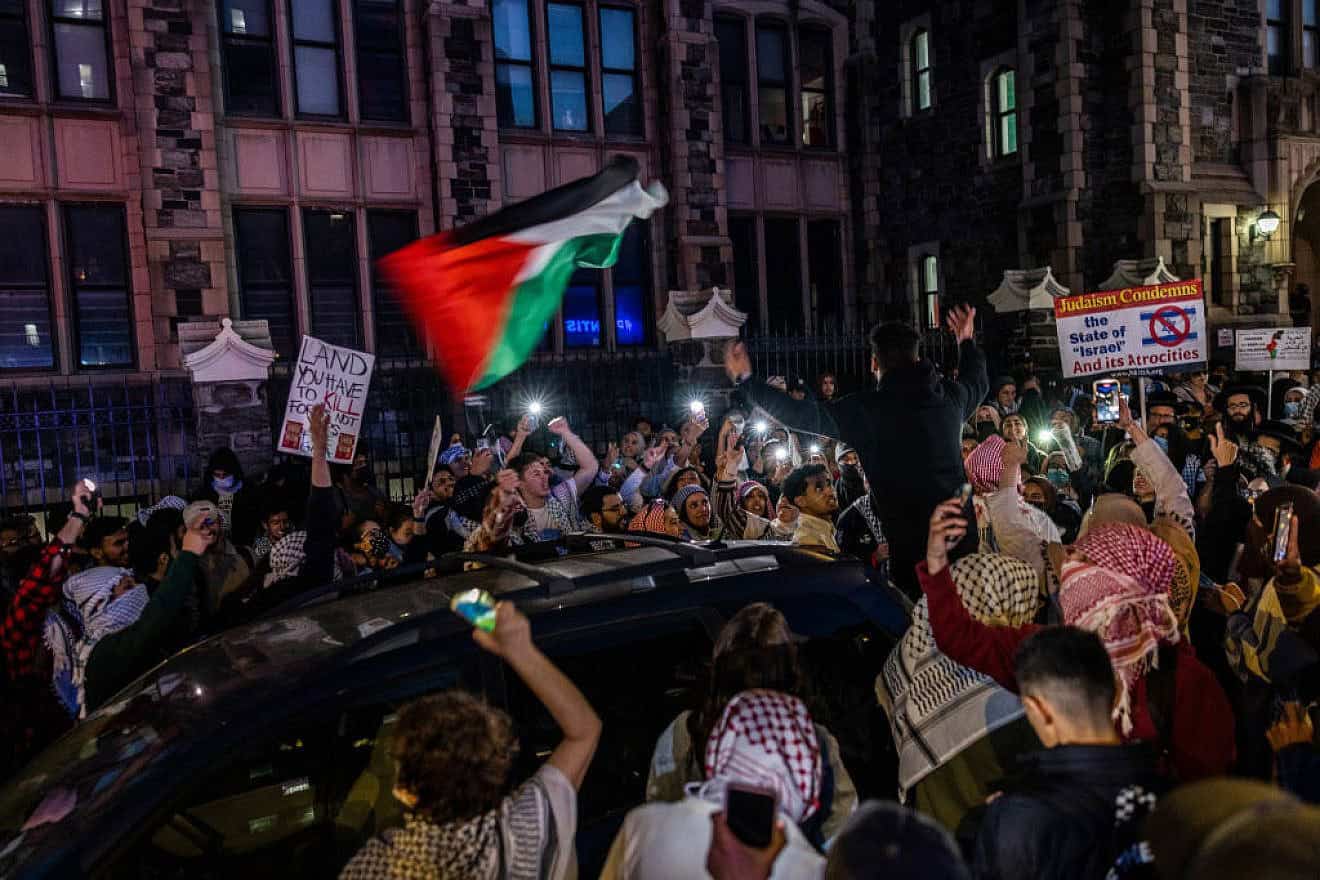 Anti-Israeli protesters chant outside the City College Of New York (CUNY) in New York City on May 1, 2024. Credit: Alex Kent/Getty Images.
