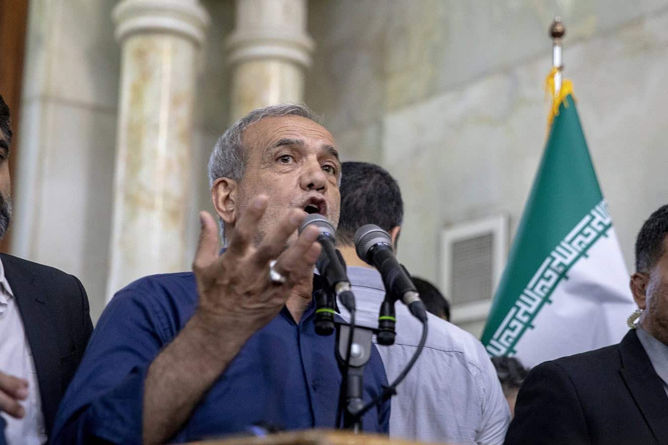 Iranian President-elect Masoud Pezeshkian speaks during a visit to the shrine of the Islamic Republic's founder, Ayatollah Ruhollah Khomeini, July 6, 2024. Photo by Majid Saeedi/Getty Images.