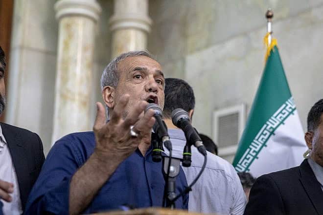 Iranian President-elect Masoud Pezeshkian speaks during a visit to the shrine of the Islamic Republic's founder, Ayatollah Ruhollah Khomeini, July 6, 2024. Photo by Majid Saeedi/Getty Images.