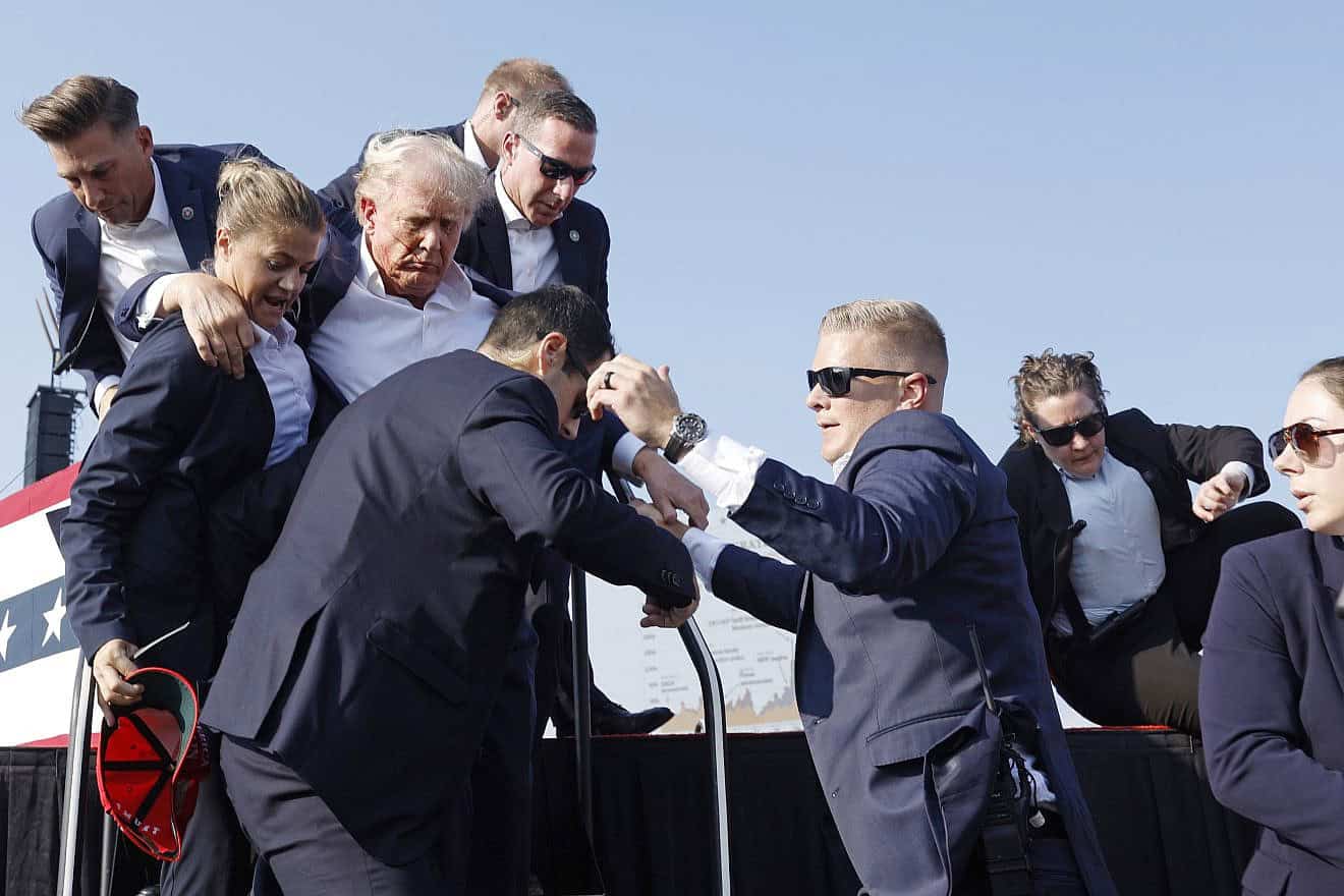 Former President Donald Trump is rushed offstage during a rally in Butler, Pa. on July 13, 2024. Photo by Anna Moneymaker/Getty Images.