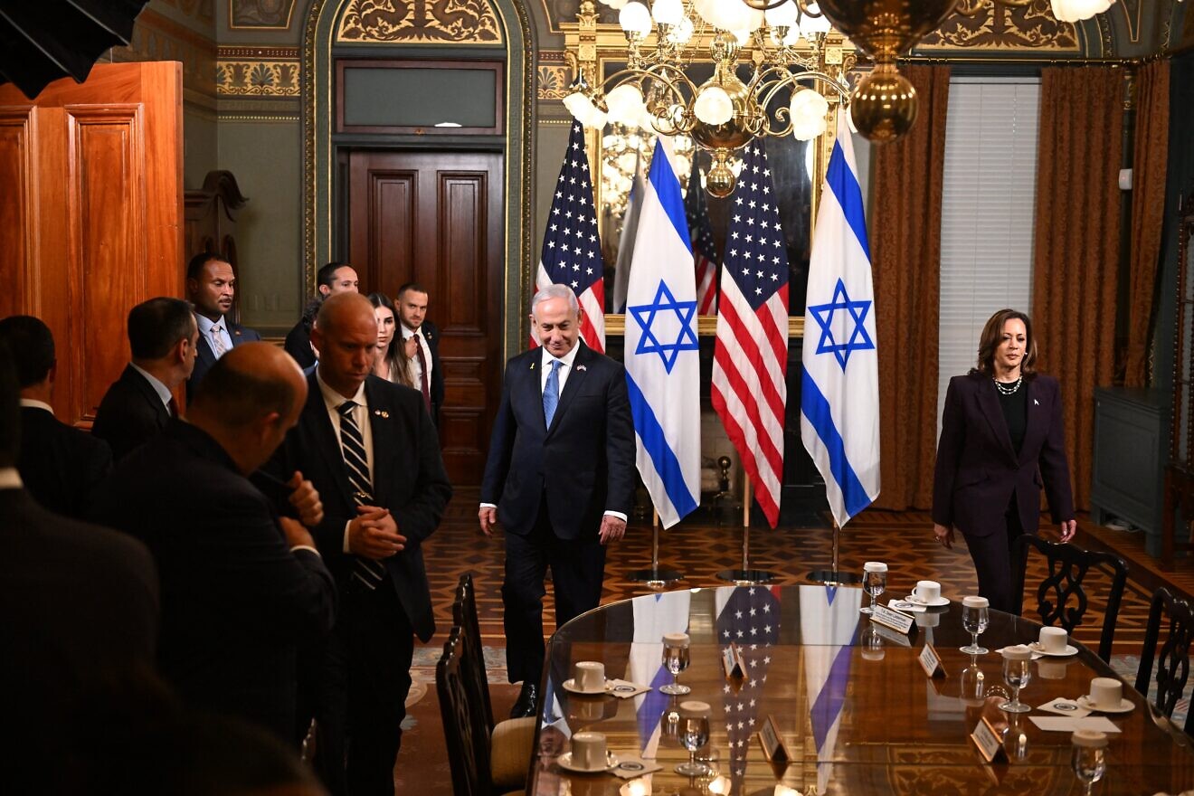 Israeli Prime Minister Benjamin Netanyahu and U.S. Vice President Kamala Harris walk to their seats prior to talks in the vice president's ceremonial office at the Eisenhower Executive Office Building in Washington, D.C, on July 25, 2024. Photo by Roberto Schmidt/AFP via Getty Images.