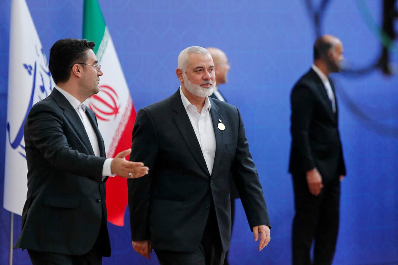 Hamas leader Ismail Haniyeh arrives to participate in the swearing in ceremony for the new Iranian President, Masoud Pezeshkian, at the parliament in Tehran on July 30, 2024. Photo by Saman/Middle East Images/AFP via Getty Images.