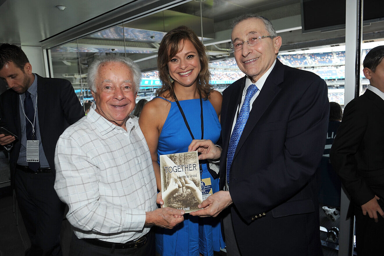 From left; Mark Schonwetter, Ann Arnold and Rabbi Marvin Hier attend a Simon Wiesenthal Center 9/11 event at Yankee Stadium on Sept. 11, 2016. Photo by Brad Barket/Getty Images for the Simon Wiesenthal Center.