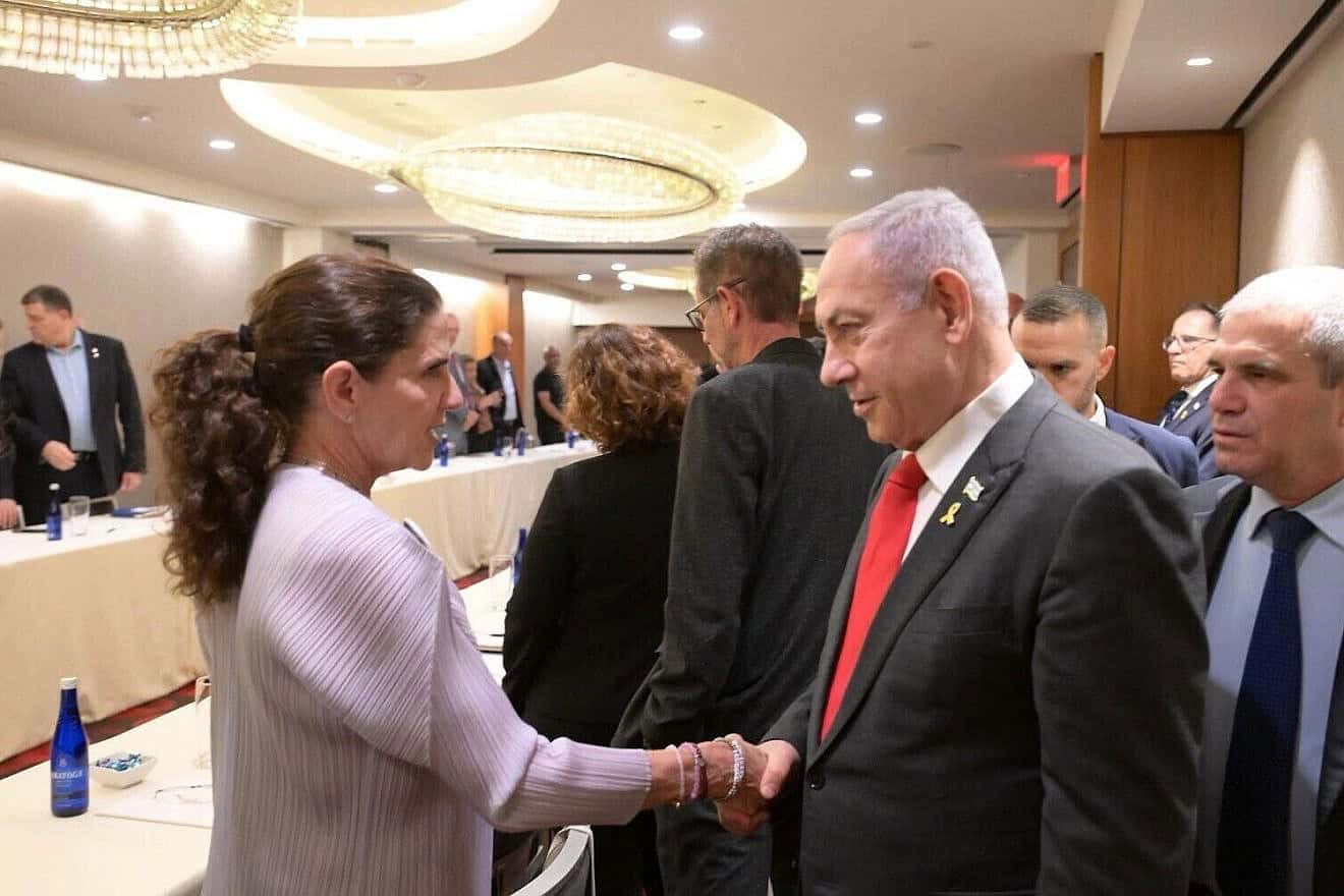 Israeli Prime Minister Benjamin Netanyahu greets Liz Hirsh Naftali, whose 4-year-old great niece Abigail Mor Edan was released after 50 days in Hamas captivity, ahead of a meeting with the families of hostages held by Hamas in Gaza in Washington on July 22, 2024. Photo by Amos Ben Gershon/GPO.