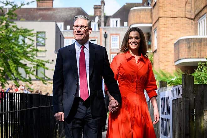 Keir and Victoria Starmer arrive at a polling station in London to vote in the general election in the United Kingdom on July 4, 2024. Photo by Leon Neal/Getty Images.