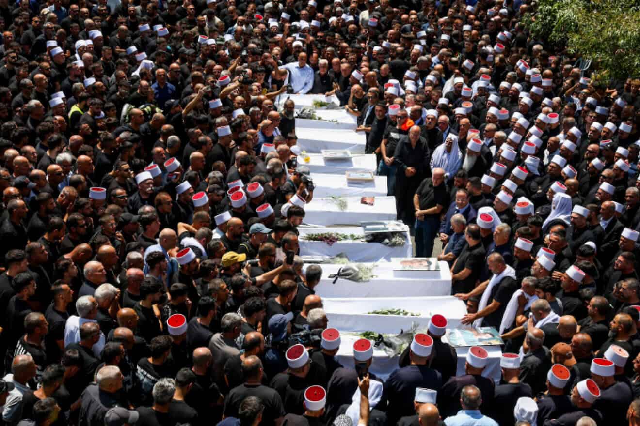 Mourners attend the funeral of Druze children who were killed at a soccer field by a Lebanese rocket, July 28, 2024. Photo by David Cohen/Flash90.