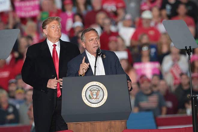 Rep. Mike Bost speaks alongside Donald Trump during a campaign rally at Southern Illinois Airport in Murphysboro, Oct. 27, 2022. Photo by Scott Olson/Getty Images.