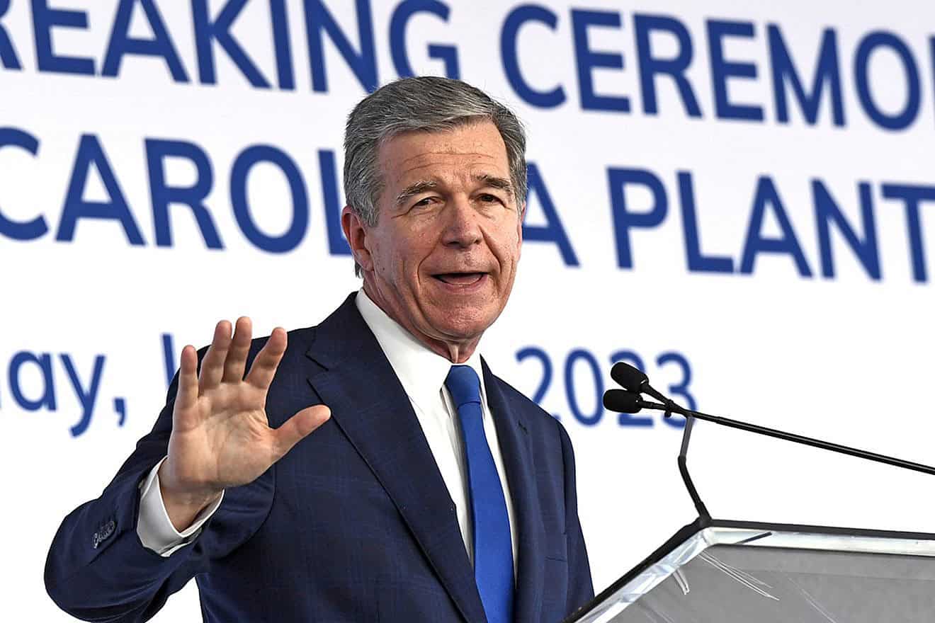 North Carolina Gov. Roy Cooper speaks as Electric carmaker Vinfast breaks ground in its $4b manufacturing plant, located within the Triangle Innovation Point in Chatham County, N.C., on July 28, 2023. Photo by Nick Ut/Getty Images.
