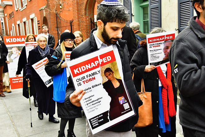 Every Shabbat afternoon since Nov. 4, pro-Israel Manhattan residents have marched for about 45 minutes carrying signs drawing attention to the hostages whom Hamas holds in the Gaza Strip. Photo by Phillip Maier.