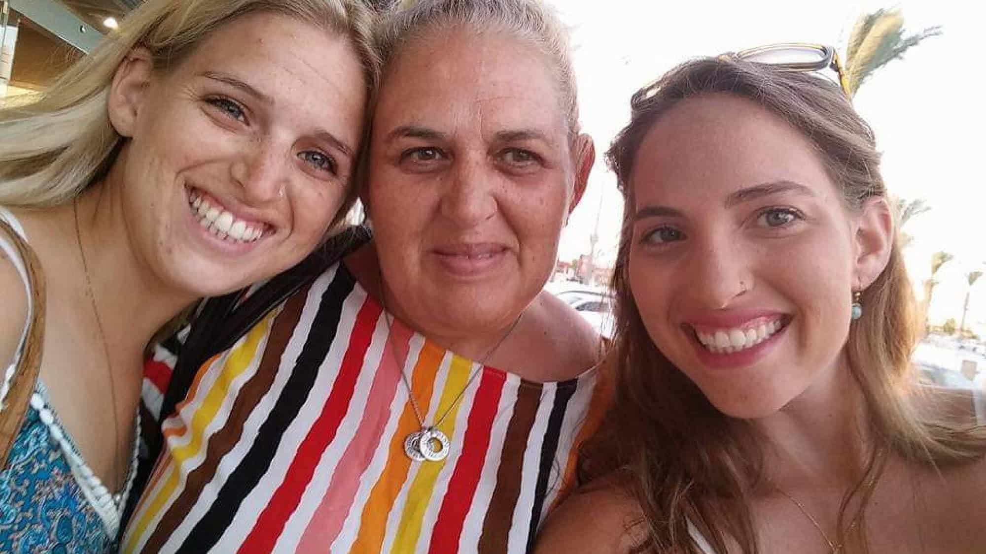 Hamas hostage Doron Steinbrecher (left) with her mother Simona (center) and her sister Yamit Ashkenazi. Credit: The Hostage and Missing Families Forum.