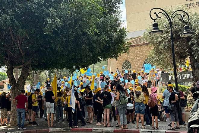 People rally in Rehovot to mark the 20th birthday of city resident Nimrod Cohen, a prisoner of Hamas in Gaza. Photo by Vardit Alon-Korpel.