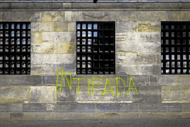 The word "Intifada" spray-painted on the walls of the Royal Palace of Amsterdam. Source: Twitter.