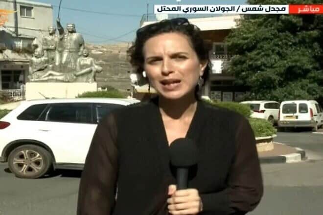 "Al Mayadeen" reporter Hanaa Mahamid broadcasts live from Majdal Shams in the Golan Heights, where a rocket fired by Lebanese Hezbollah killed 12 children, July 28, 2024. Source: Screenshot/X.